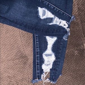 High rise frayed bottom distressed jeans